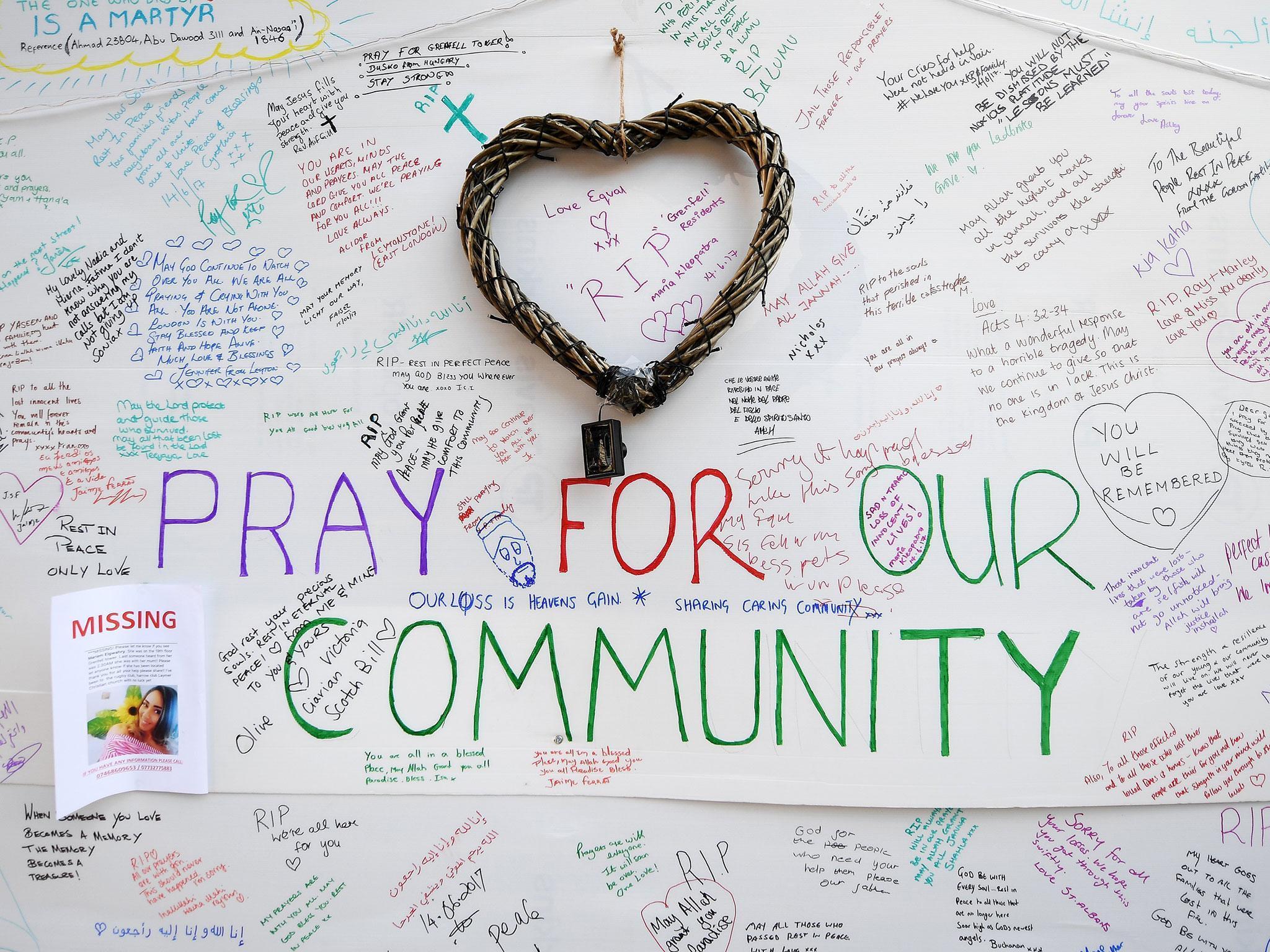 Messages of condolence left at a relief centre close to the scene of the fire (EPA)