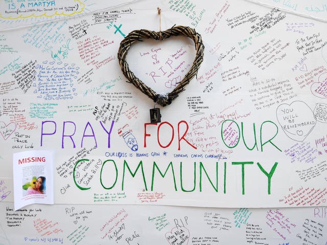 Messages of condolence left at a relief centre close to the scene of the fire