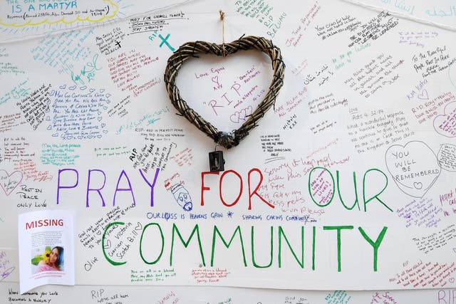 Messages of condolence left at a relief centre close to the scene of the fire