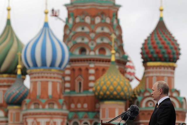 The US Senate voted to impose new sanctions on Russia. President Vladimir Putin speaks in Moscow's Red Square on 9 May 2017