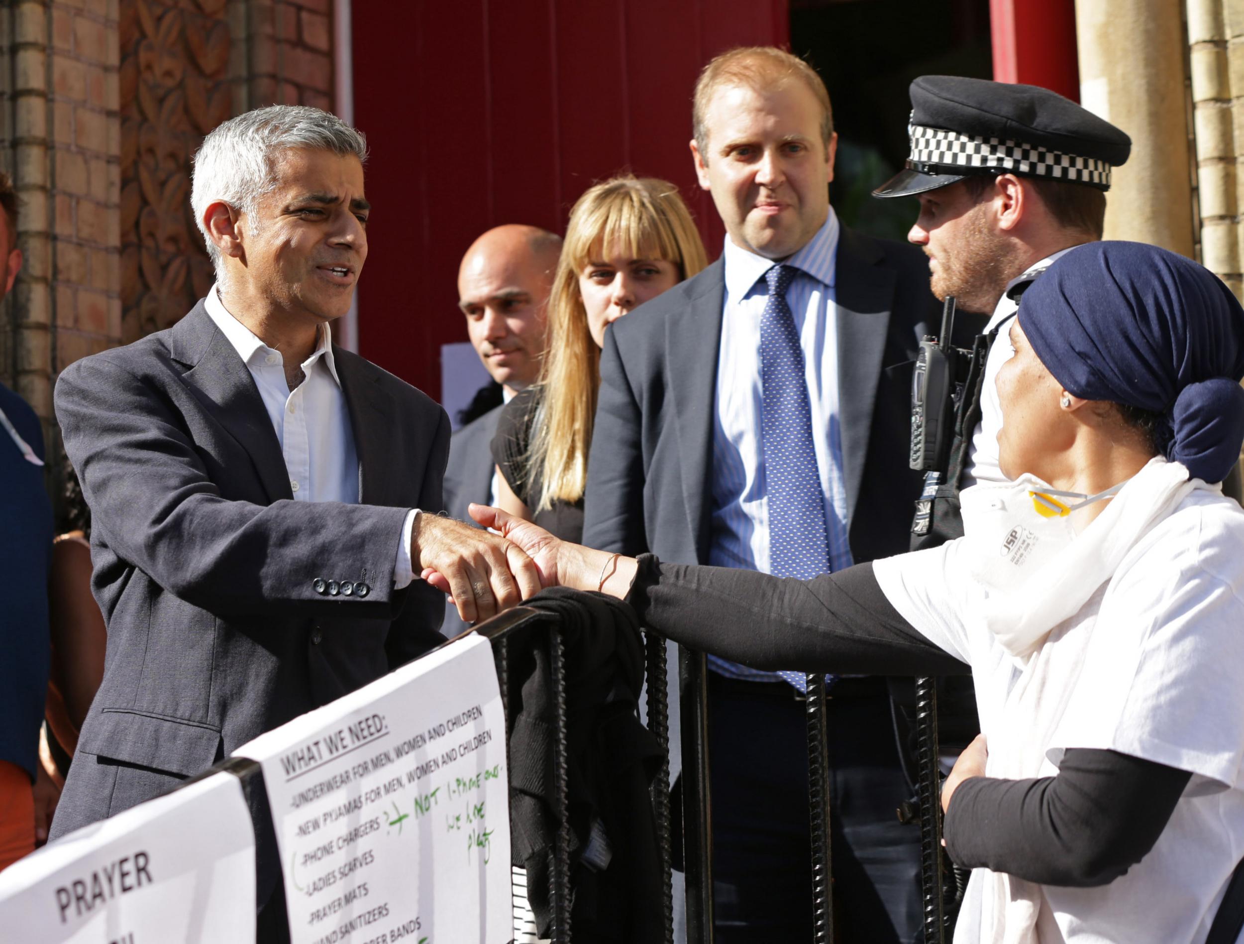 Mayor of London Sadiq Khan leaves Notting Hill Methodist Church near Grenfell Tower