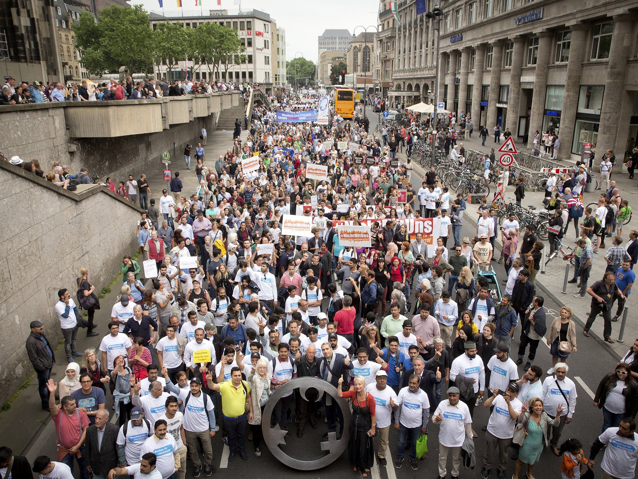 Hundreds of Muslims take part in 'The Not With Us' rally against the extremism in Cologne, Germany