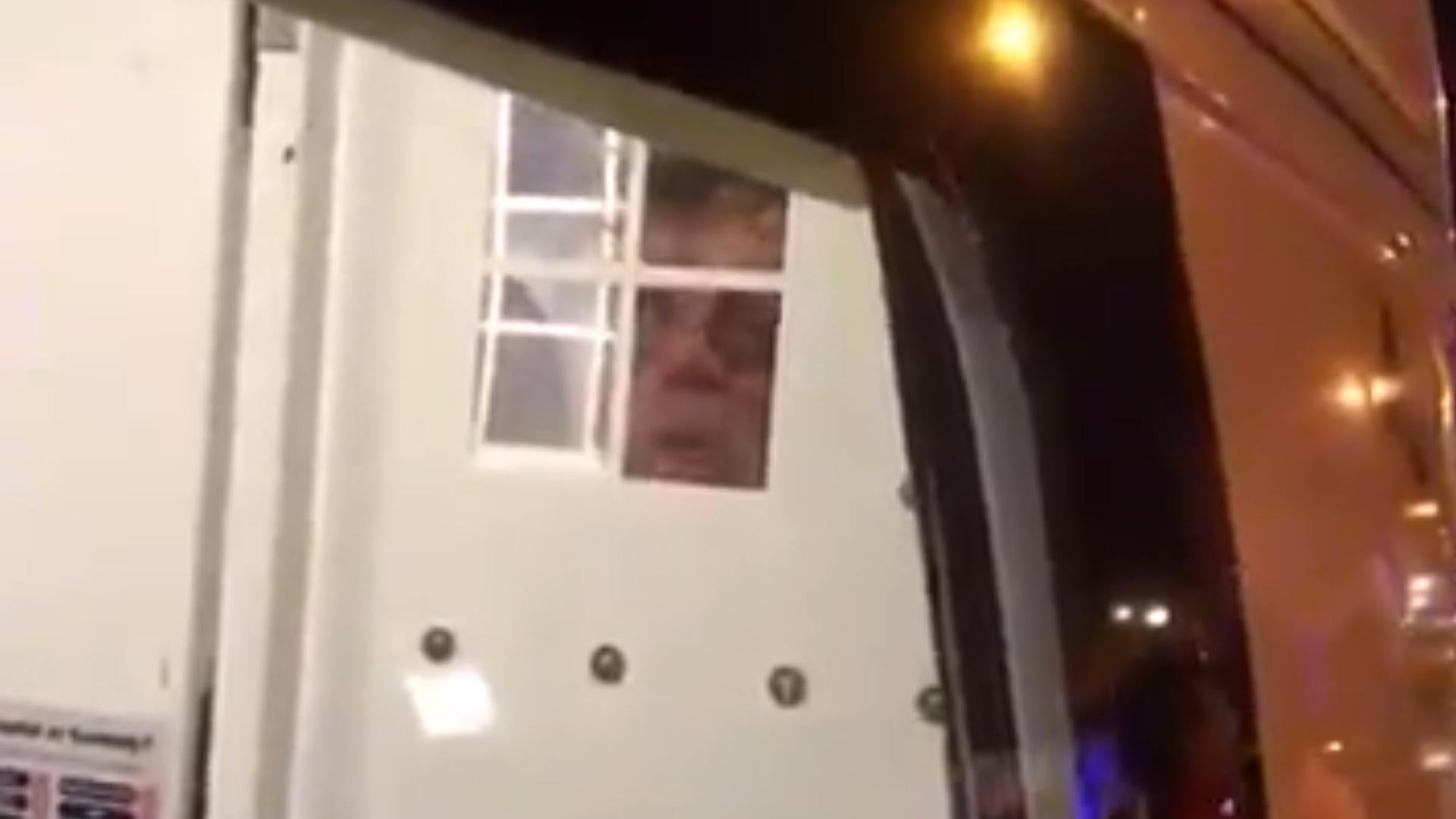 Finsbury Park mosque terror attack suspect appears to blow a kiss from inside police van