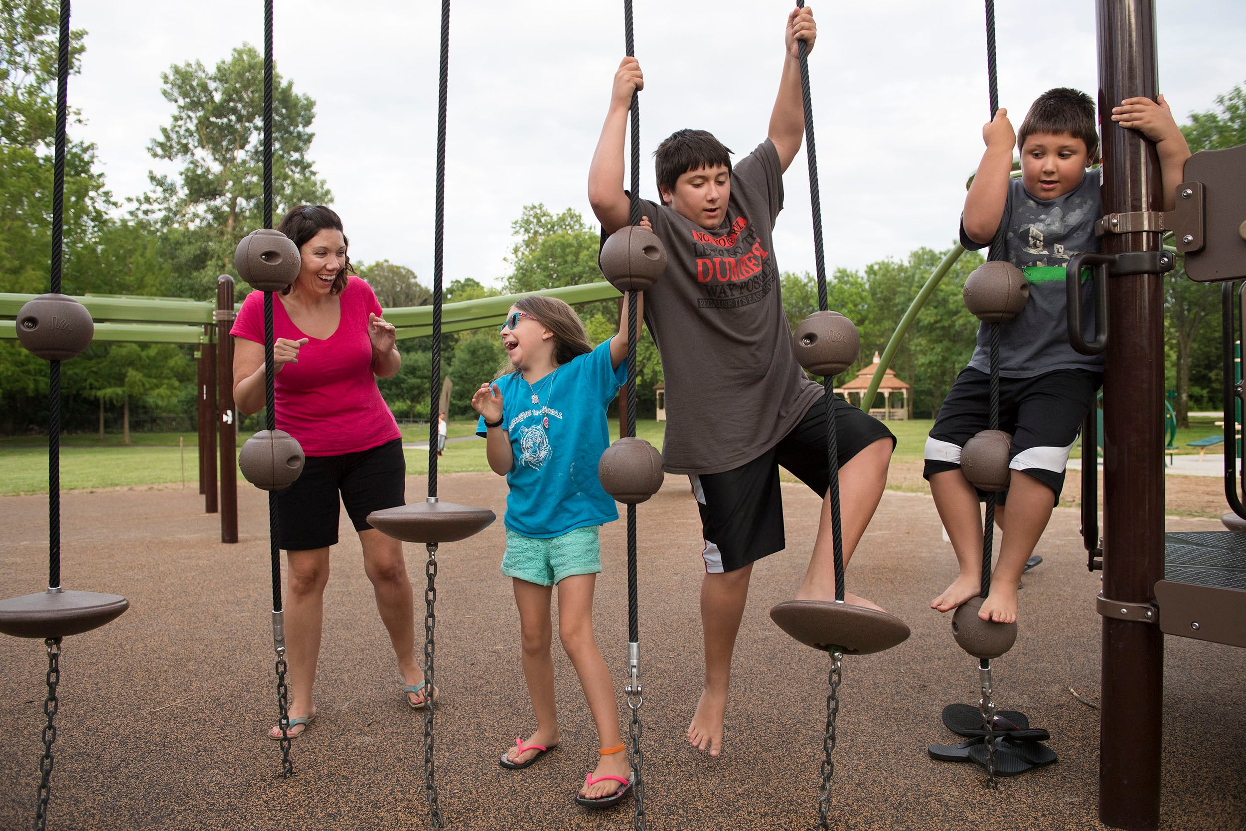 Dawn Chapman and her children, from left, Sophie, Connor and Quinn, at a park in a neighbouring community (Washington Post/Linda Davidson)