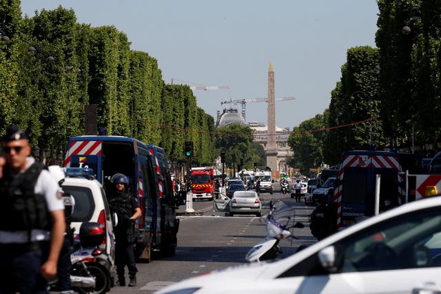 French police secure the area on the Champs Elysees avenue after an incident in Paris, France, 19 June 2017
