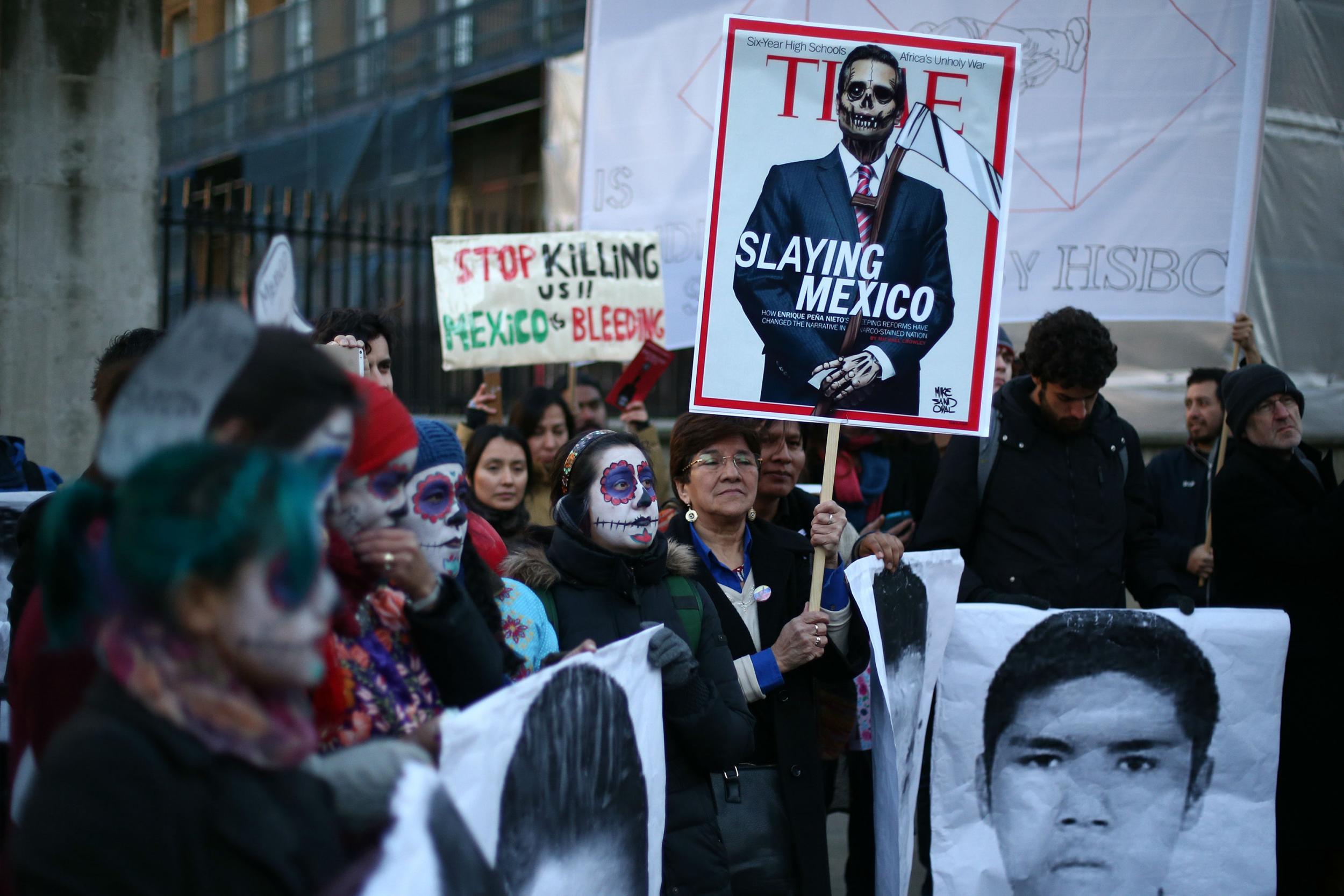 Protesters take part in a demonstration against alleged corruption and violations of human rights by Enrique Pena Nieto, the President of Mexico, on March 3, 2015 in London