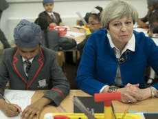 Theresa May U-turns on scrapping of free primary school meals 