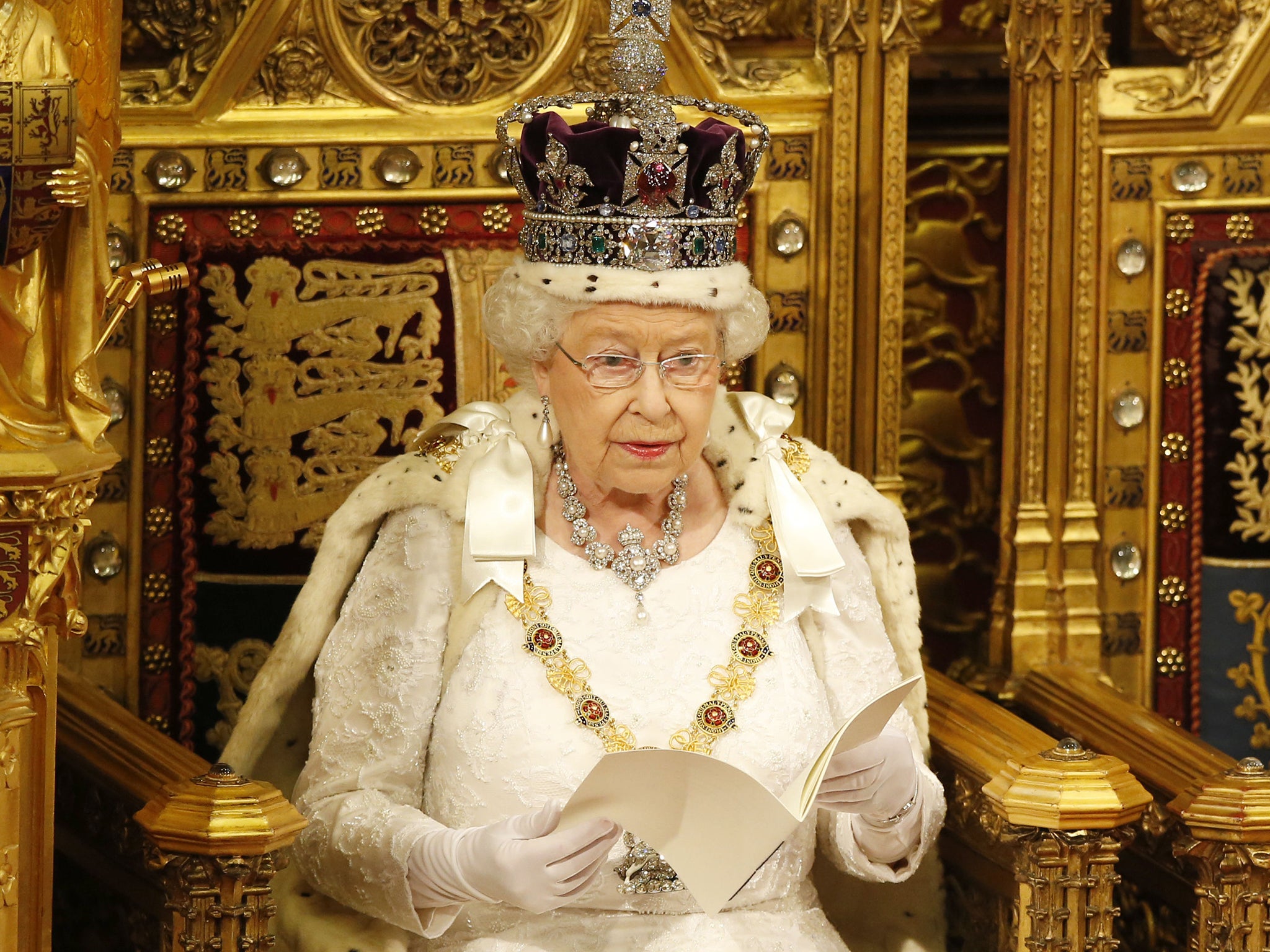 Queen Elizabeth II delivers a prior Queen's Speech during the State Opening of Parliament, in the House of Lords
