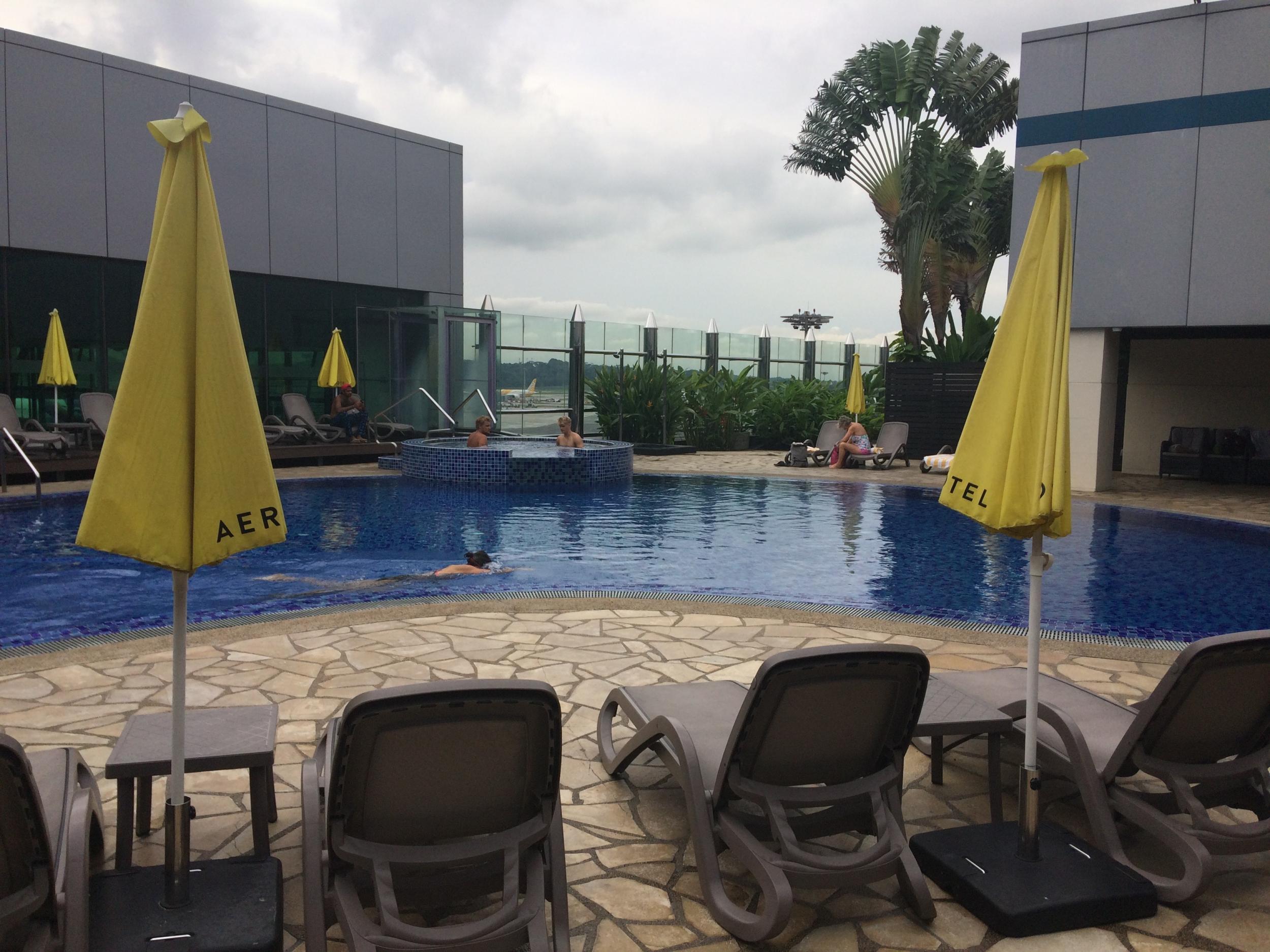 The transit hotel has a rooftop pool in the middle of the airport