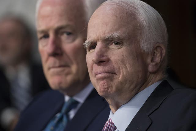 Senator John McCain listens as Attorney General Jeff Sessions testifies on the Russia probe in Washington, DC