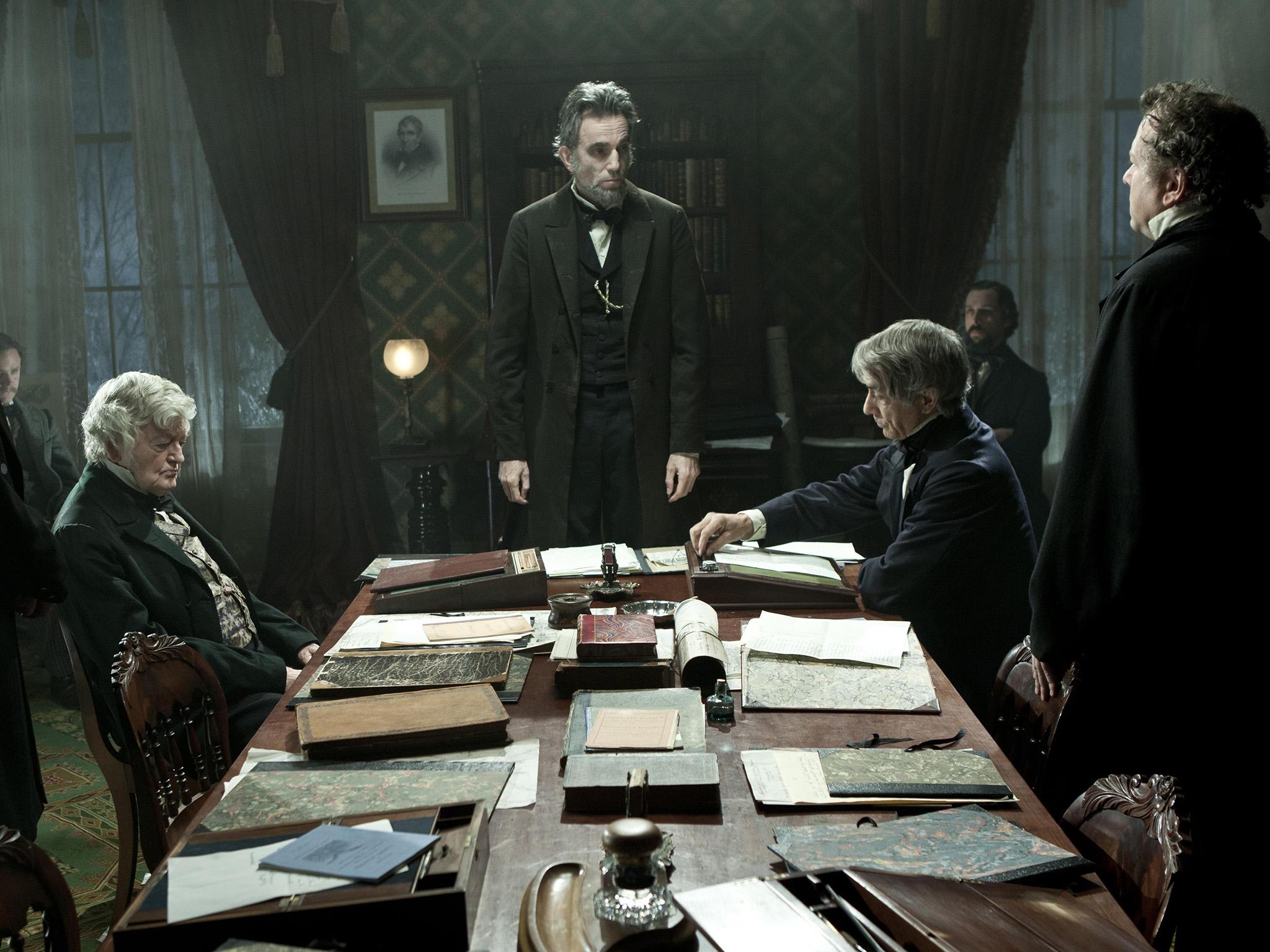 The actor (centre) won an Oscar for his role as the?US?President Abraham Lincoln in 'Lincoln' (Rex)