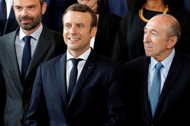 French President Emmanuel Macron (centre), Prime Minister Edouard Philippe (left) and Interior Minister Gerard Collomb at the Elysee Palace in Paris