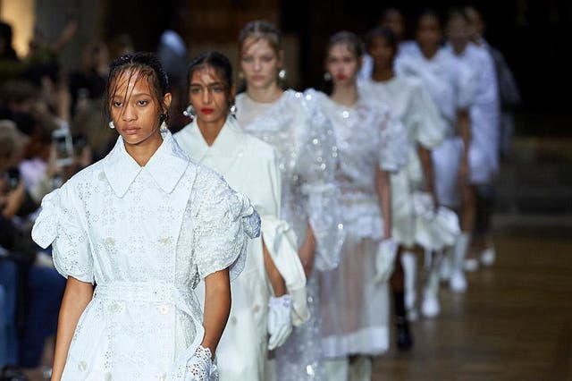 The runway at Simone Rocha was dominated by model’s adorned in frocks that resembled communion gowns, wedding and baptism dresses