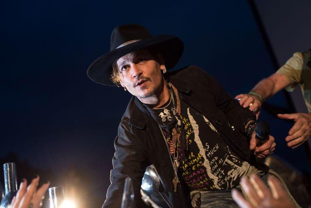 Johnny Depp made controversial remarks about Donald Trump and 'assassination' while introducing a film at Glastonbury Festival