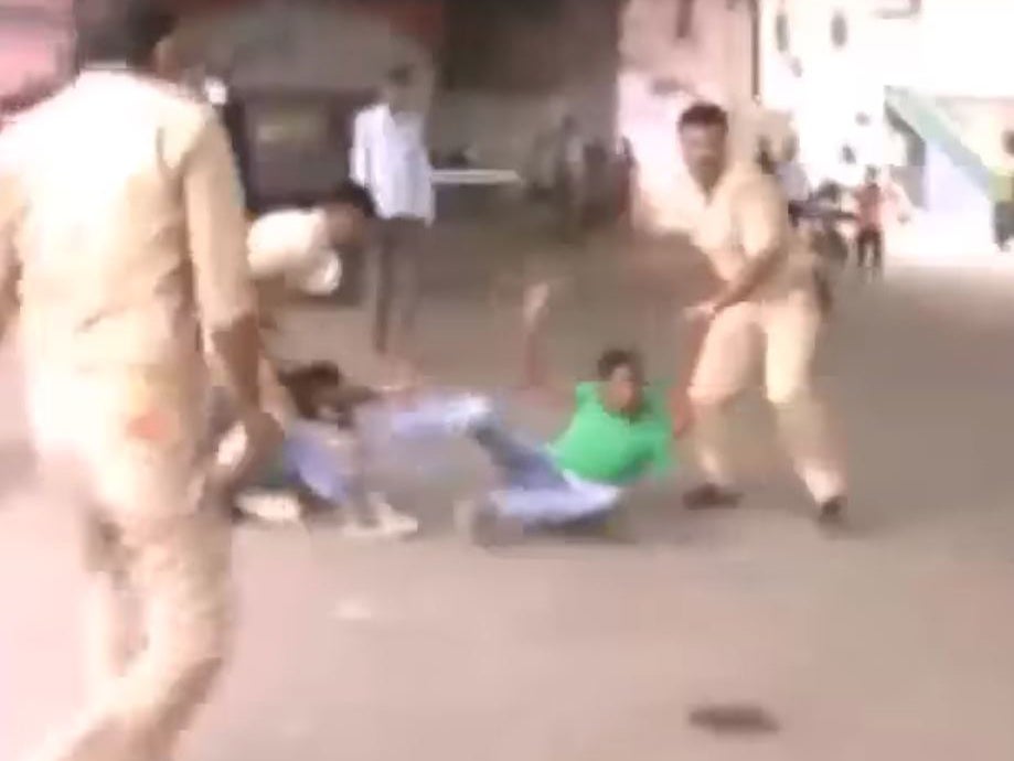 Police clash with protesters after the alleged rape of a 17-year-old girl in Kanpur, India