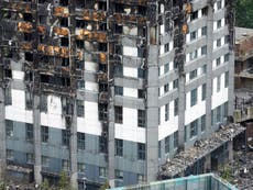 May calls for 'investigation' after 95 buildings fail Grenfell tests