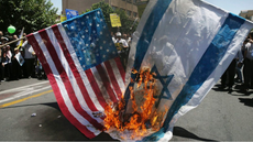 Iranians burn flags and chant 'death to Israel' at annual rally