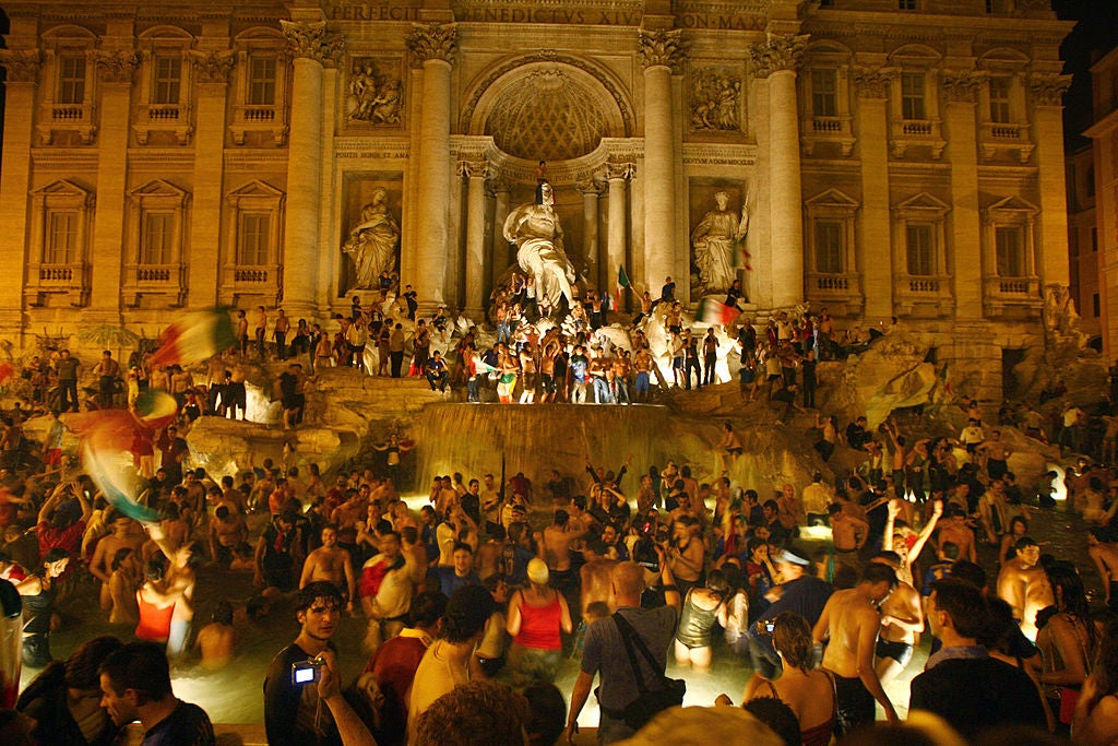 Italy fans celebrate the country’s 2006 World Cup win over France (AFP/Getty)