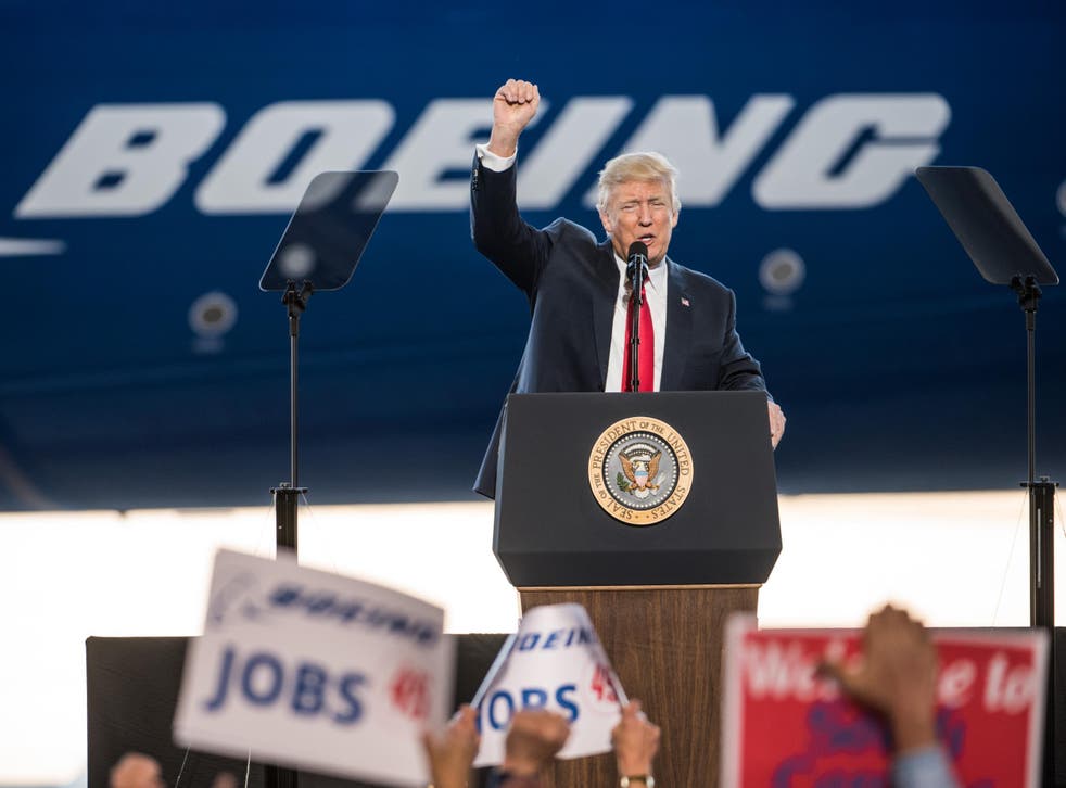 Donald Trump addresses a crowd during the debut event for the Dreamliner 787-10 at Boeing's South Carolina facilities
