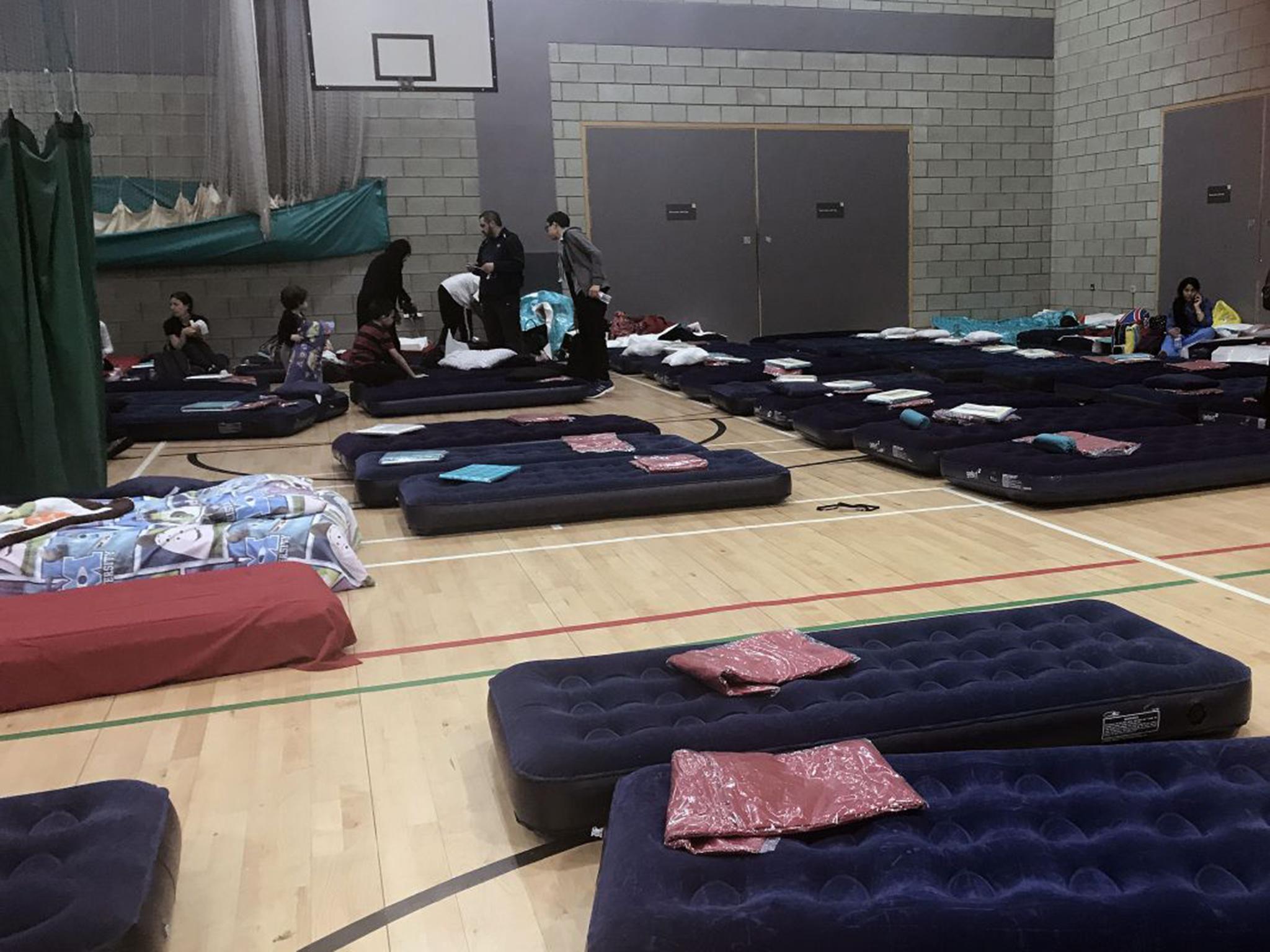 Inflatable mattresses set up at a leisure centre and library complex in Swiss Cottage (PA)