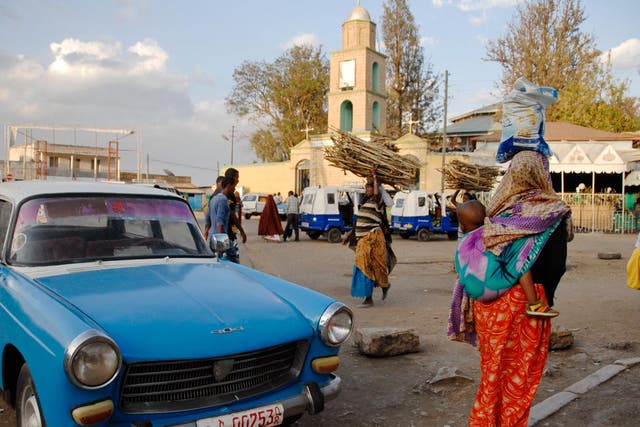 People pass across city square in Harar, Ethiopia