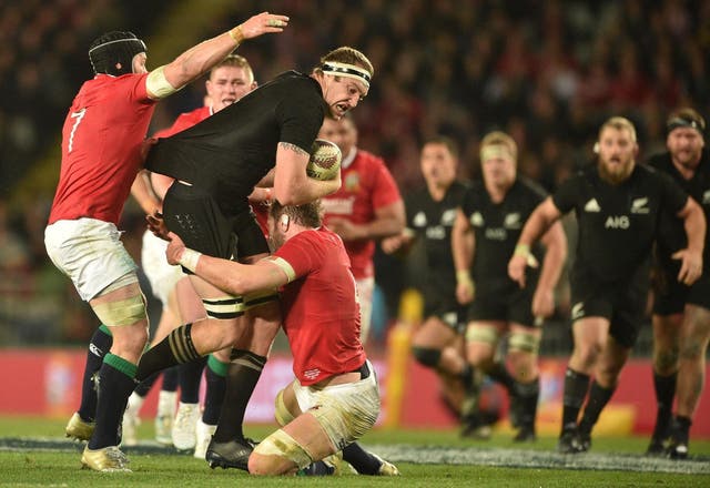 Brodie Retallick charges into Alun Wyn Jones and Sean O'Brien during the first Test between the All Blacks and British and Irish Lions