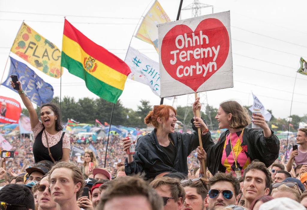 Fans cheer for Jeremy Corbyn as he speaks on the Pyramid Stage at Glastonbury