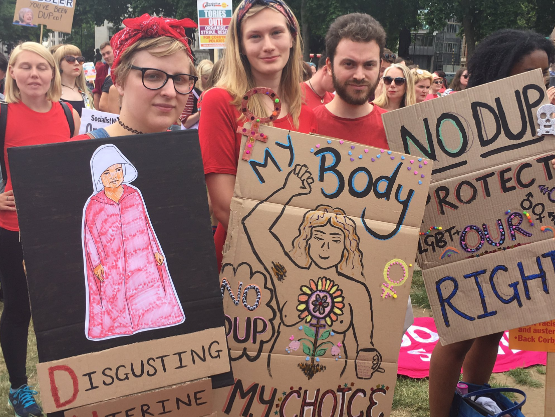 Protesters descended on Whitehall to campaign against a Tory deal with the DUP, which has drawn criticism for its right-wing stance on gay rights and abortion