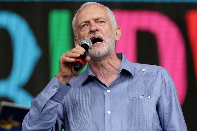 Labour leader Jeremy Corbyn speaks to the crowd from the Pyramid stage at Glastonbury Festival