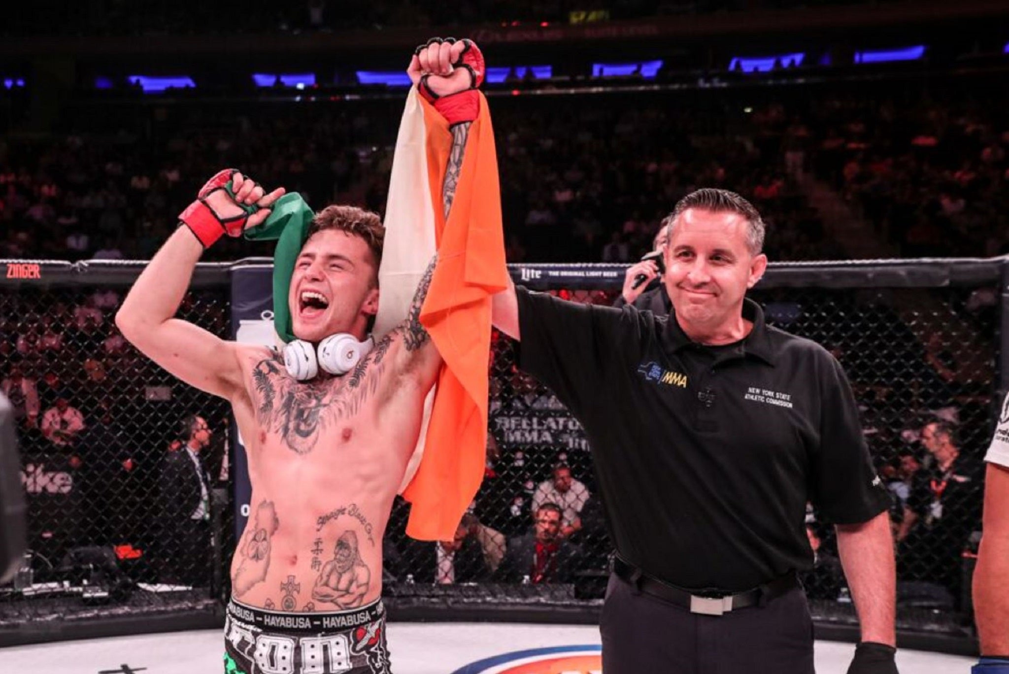 James Gallagher celebrates after his victory over Chinzo Machide