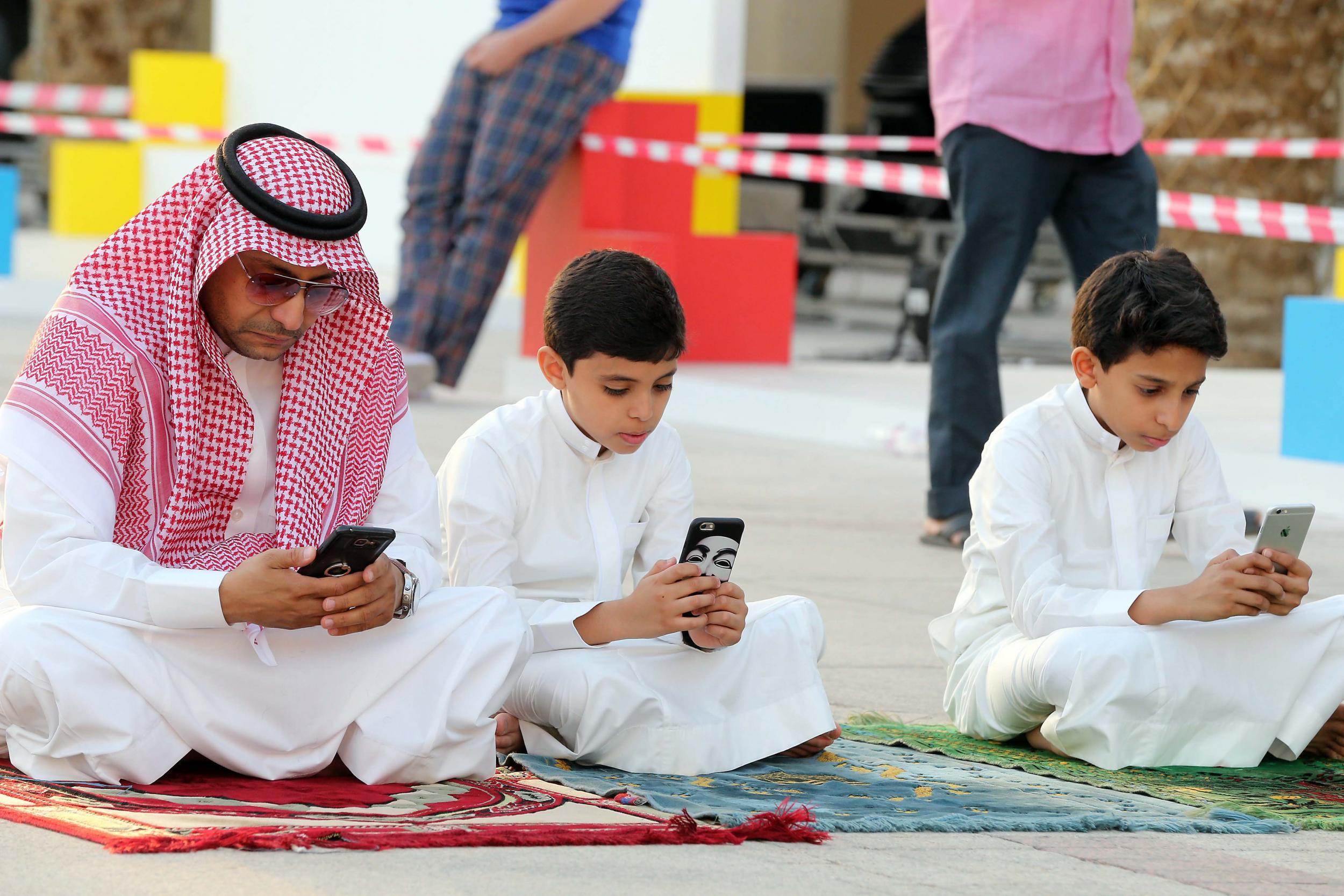 Saudis and foreigners perform prayer at the al-Masmak grand mosque of Prince Turki bin Abdulla palace in Riyadh