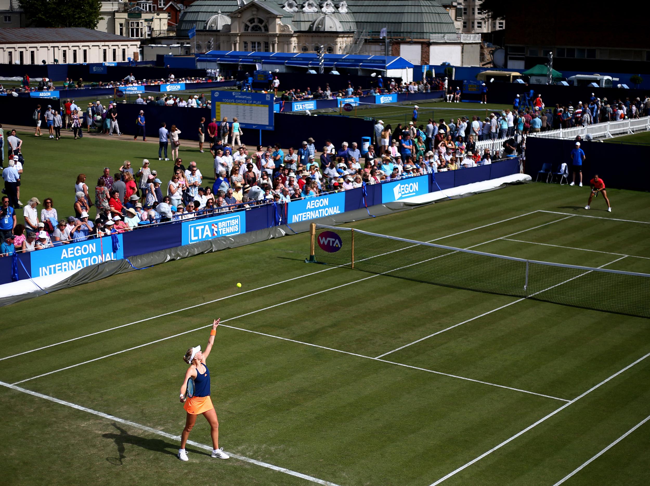 Dart playing in a qualifying match on the first day of the Aegon International Eastbourne