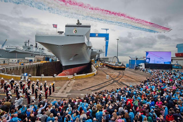 Red Arrows mark the naming of Royal Navy's new aircraft carrier HMS Queen Elizabeth by Queen Elizabeth II on 4 July, 2014 in Rosyth, Scotland