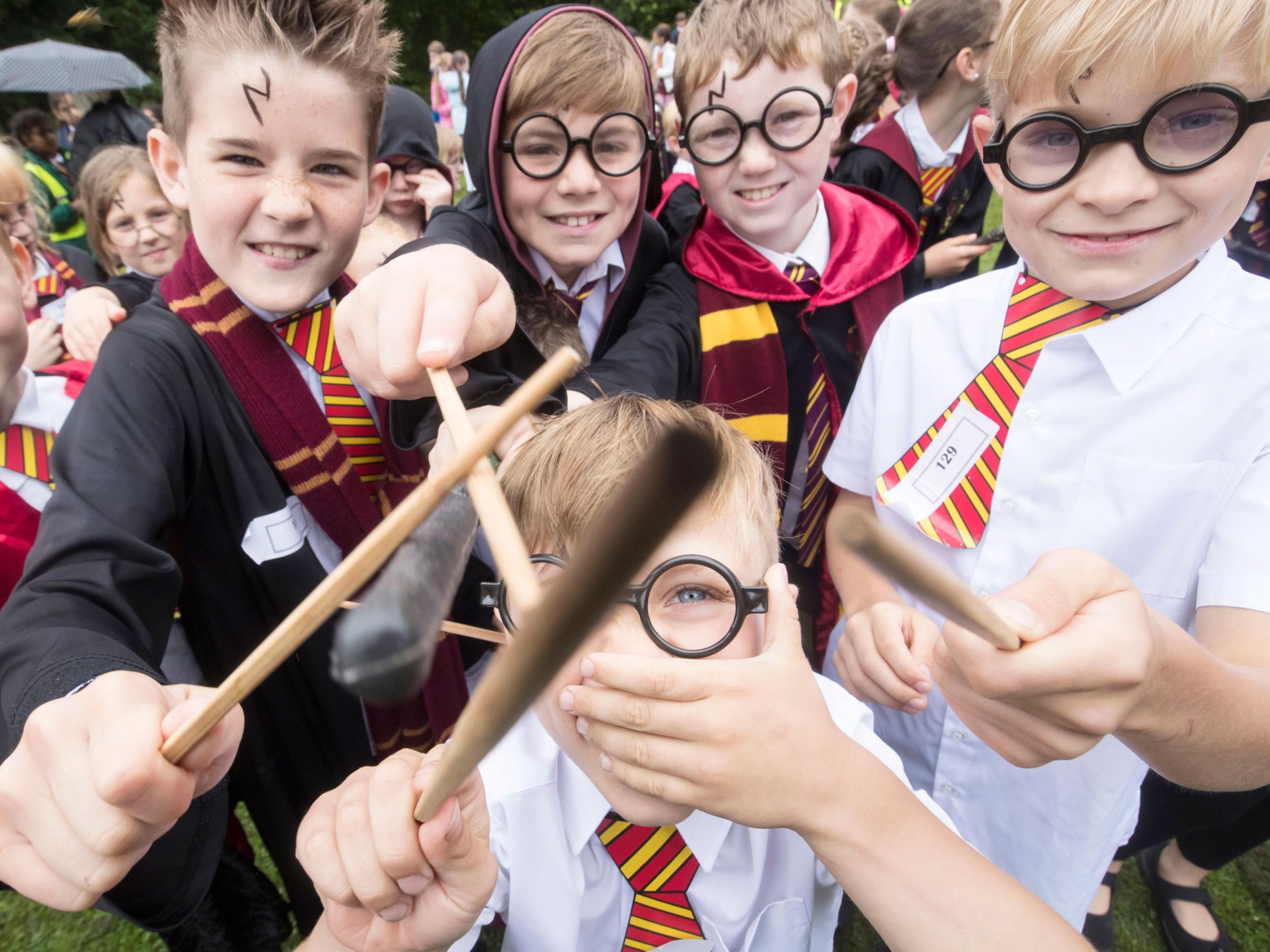 Children dressed as Harry Potter at Smithills Hall in Bolton, before they broke Guinness World Record for the Largest Gathering of People Dressed as the boy wizard