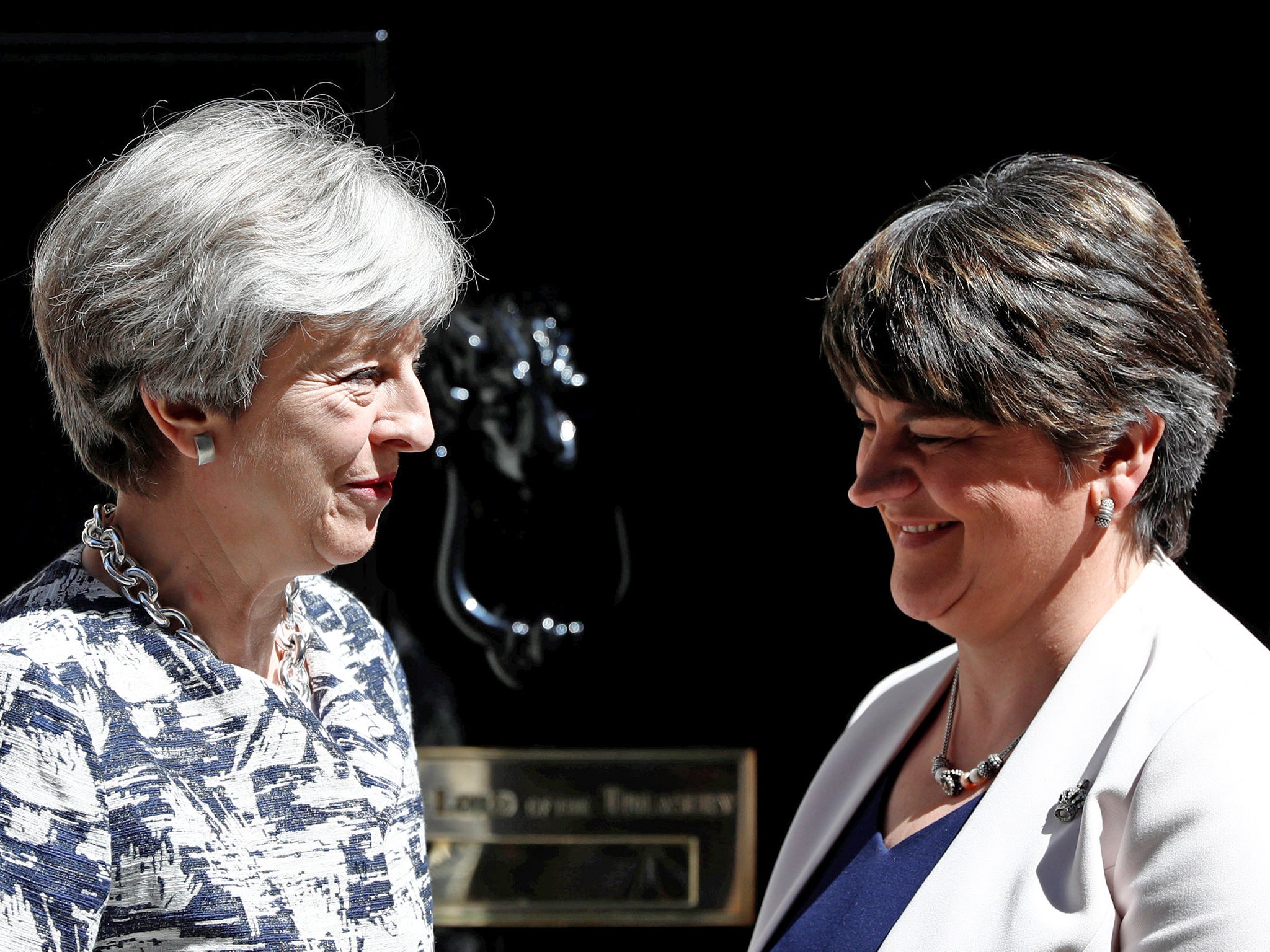 All smiles: Theresa May with DUP leader Arlene Foster outside Number 10