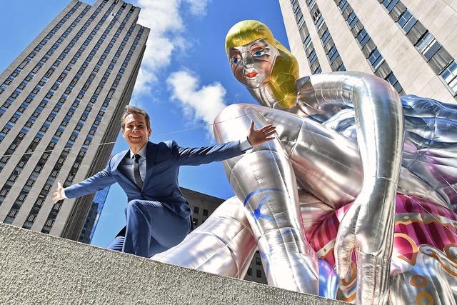 Koons unveils his seated ballerina inflatable sculpture at New York’s Rockefeller Center in May 2017