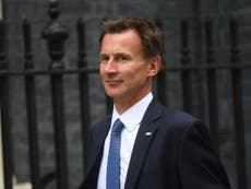Hunt reveals 'hard Brexit means people fleeing UK' document to camera