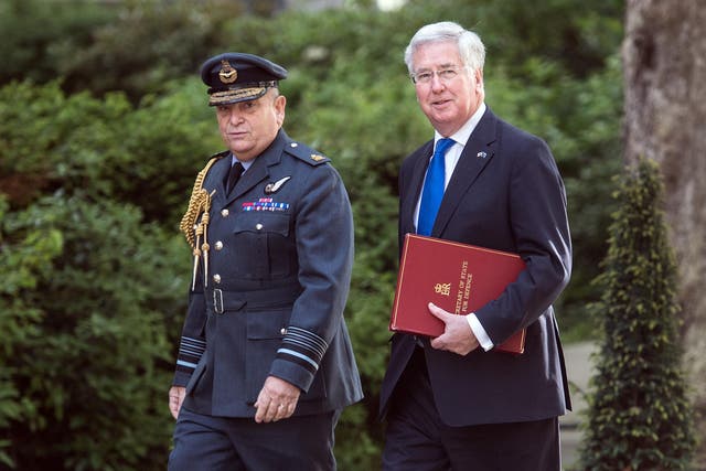 Sir Michael Fallon (right) with UK chief of defence staff Sir Stuart Peach last month