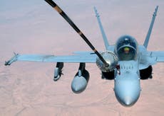 US-led airstrikes kill at least 57 prisoners in Isis-run jail