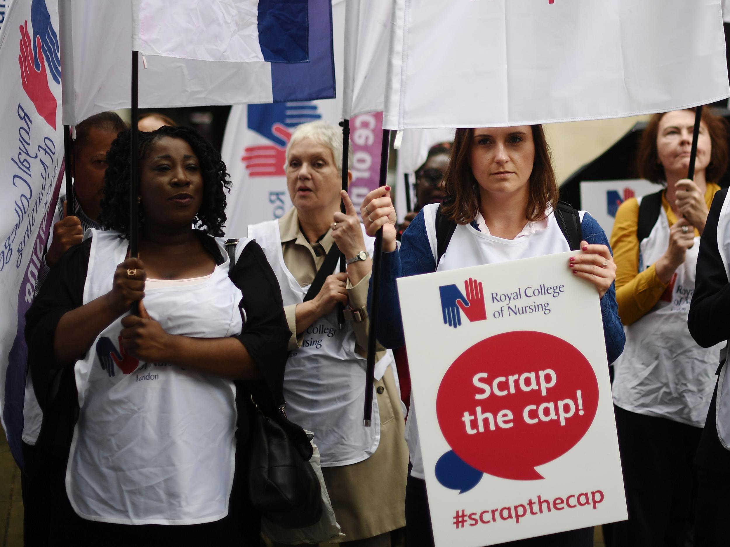 NHS nurses protest outside Health Department over low pay amp