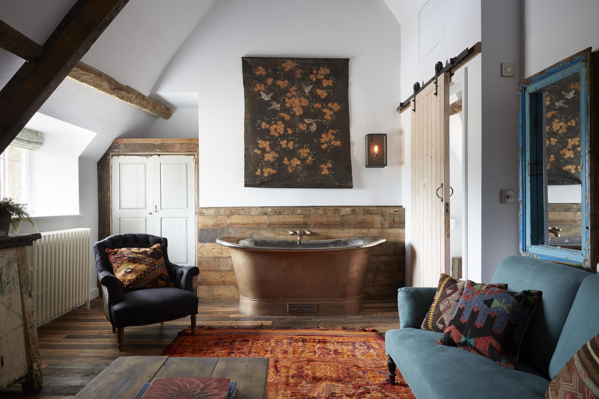 Rooms are livened up with things like freestanding copper baths