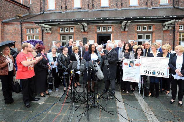 Friends and family of victims speak to the media outside Parr Hall, Warrington, where the Crown Prosecution Service said Hillsborough match commander David Duckenfield, former chief constable Sir Norman Bettison and four other individuals have been charged with offences relating to the Hillsborough disaster.