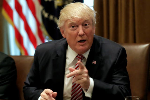 President Donald Trump talks to the media during his meeting with immigration crime victims at the White House on 28 June 2017