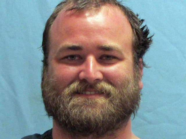 Mugshot of Michael Tate Reed from Van Buren, Arkansas, who was booked into the jail on Wednesday morning on preliminary charges of defacing objects of public interest, criminal trespass and first-degree criminal mischief