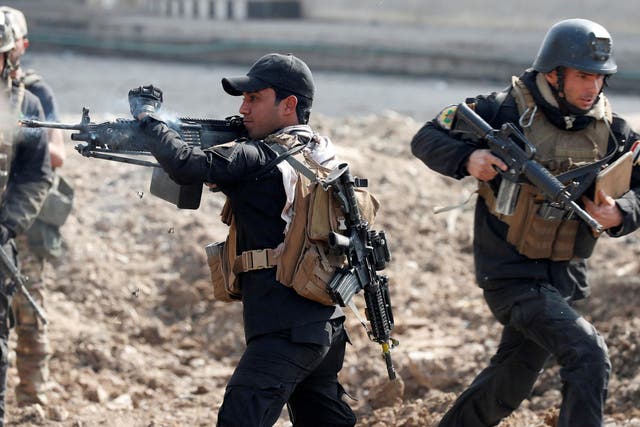 Iraqi special forces soldiers in combat in Mosul, Iraq