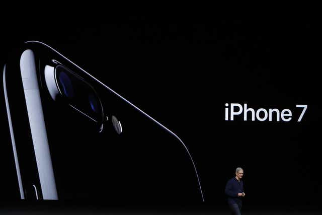 Apple CEO Tim Cook announces the new Apple iPhone 7 during a launch event on September 7, 2016 in San Francisco, California