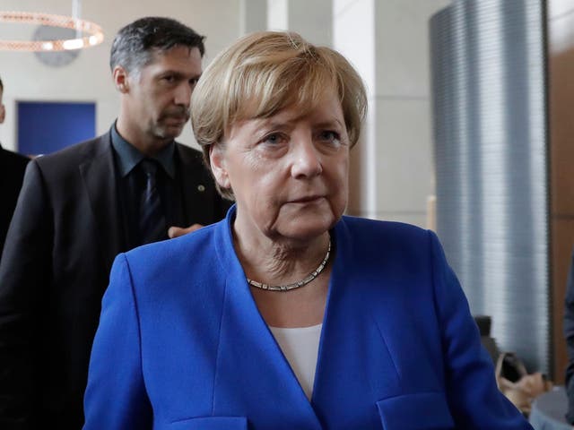 German Chancellor Angela Merkel arrives for a press statement after the Bundestag voted to legalise same-sex marriage o 30 June