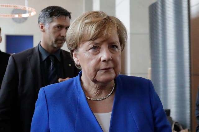 German Chancellor Angela Merkel arrives for a press statement after the Bundestag voted to legalise same-sex marriage o 30 June