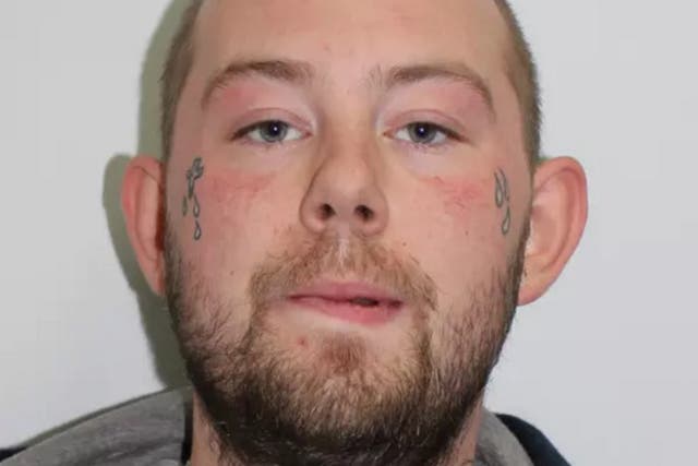 John Tomlin is wanted by Scotland Yard in connection with the acid attack