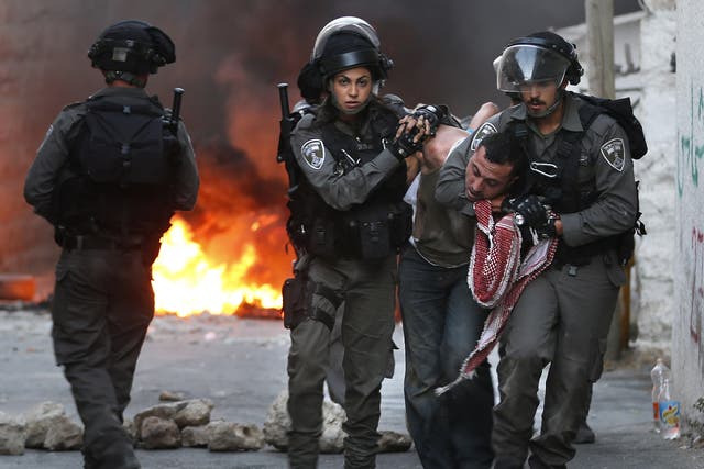 Israel police arrest Palestinian during clashes in east Jerusalem in 2015